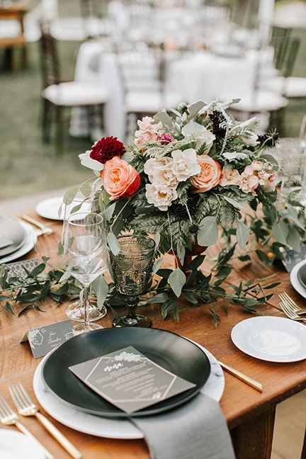 2018 Jenny & Ryan - Hidden Pond reception barn table flowers.jpg