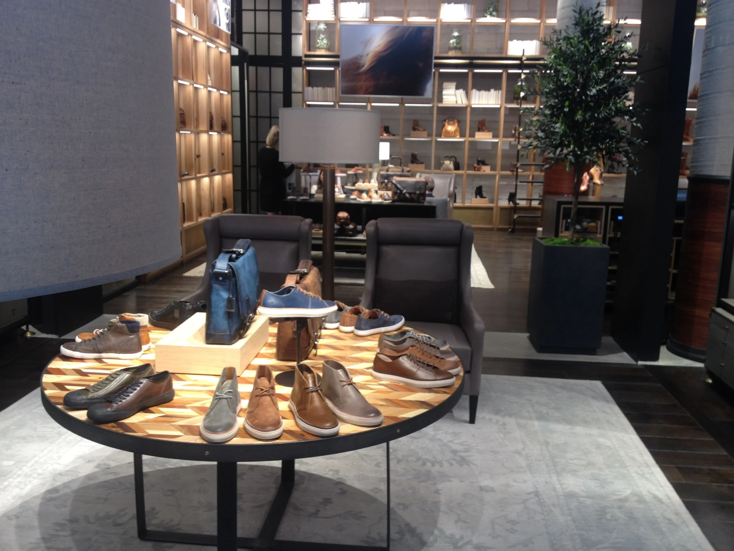  The furniture is specifically designed and crafted for The Frye Company making the showroom unique. 