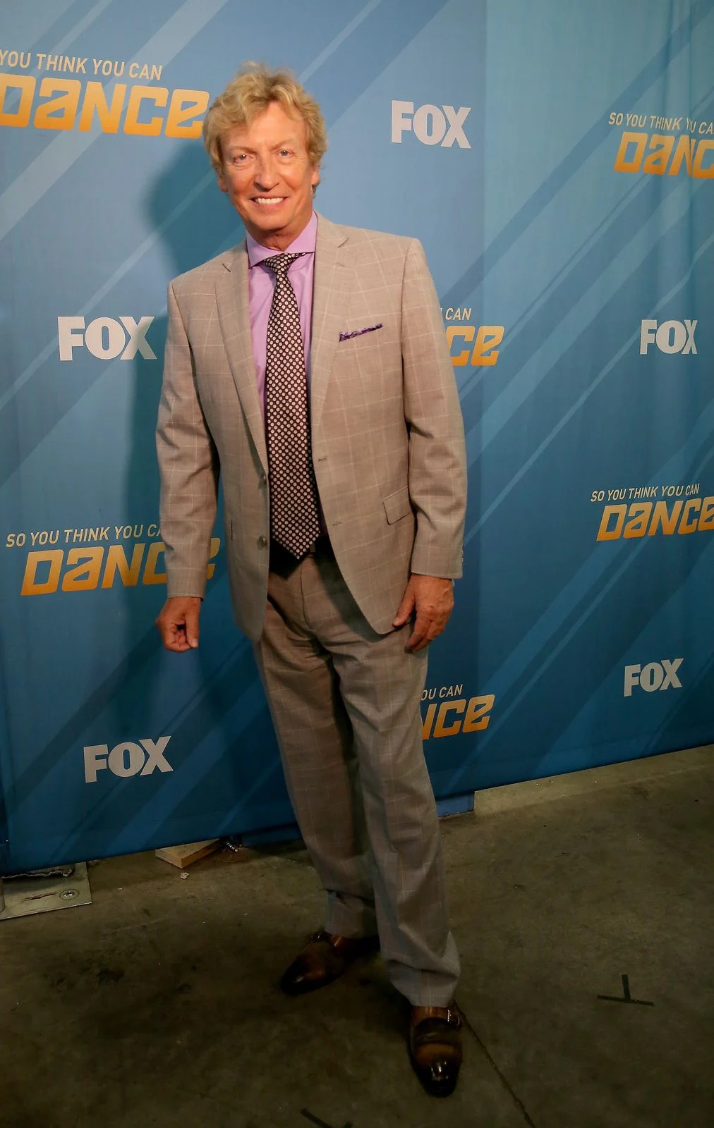 Nigel Lythgoe Suit: Tallia Orange Shirt: Ralph Lauren Purple Label Tie: Tom Ford Shoes: Max Verre Styled by Miles Siggins