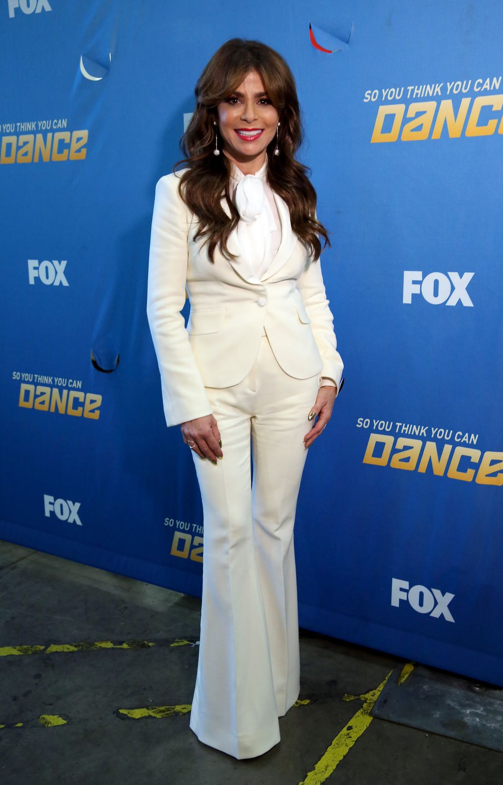   Paula Abdul  &nbsp;  Suit: custom George Clinton Bespoke  Blouse: Barbara Bui  Shoes: Charlotte Olympia  Jewelry: XIV Karats  Nails: Kimmie Kyees 