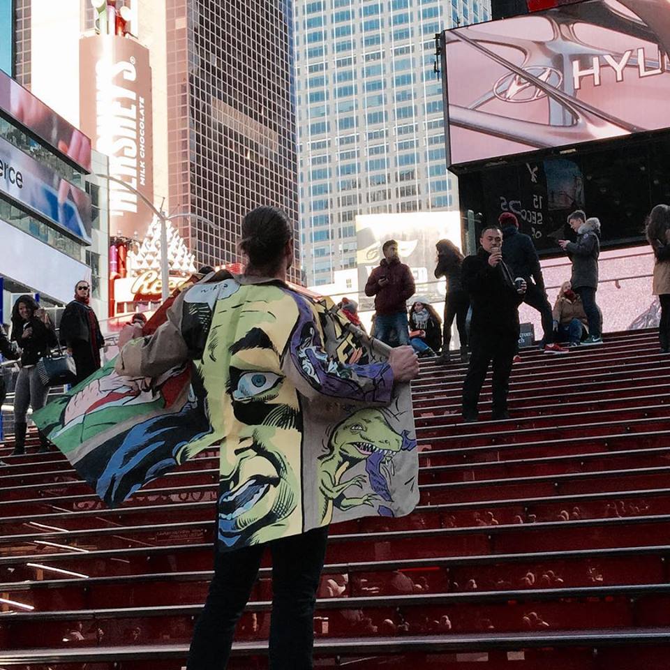   back of CARTOON coat in Times Square, &nbsp;model Dave Williams  