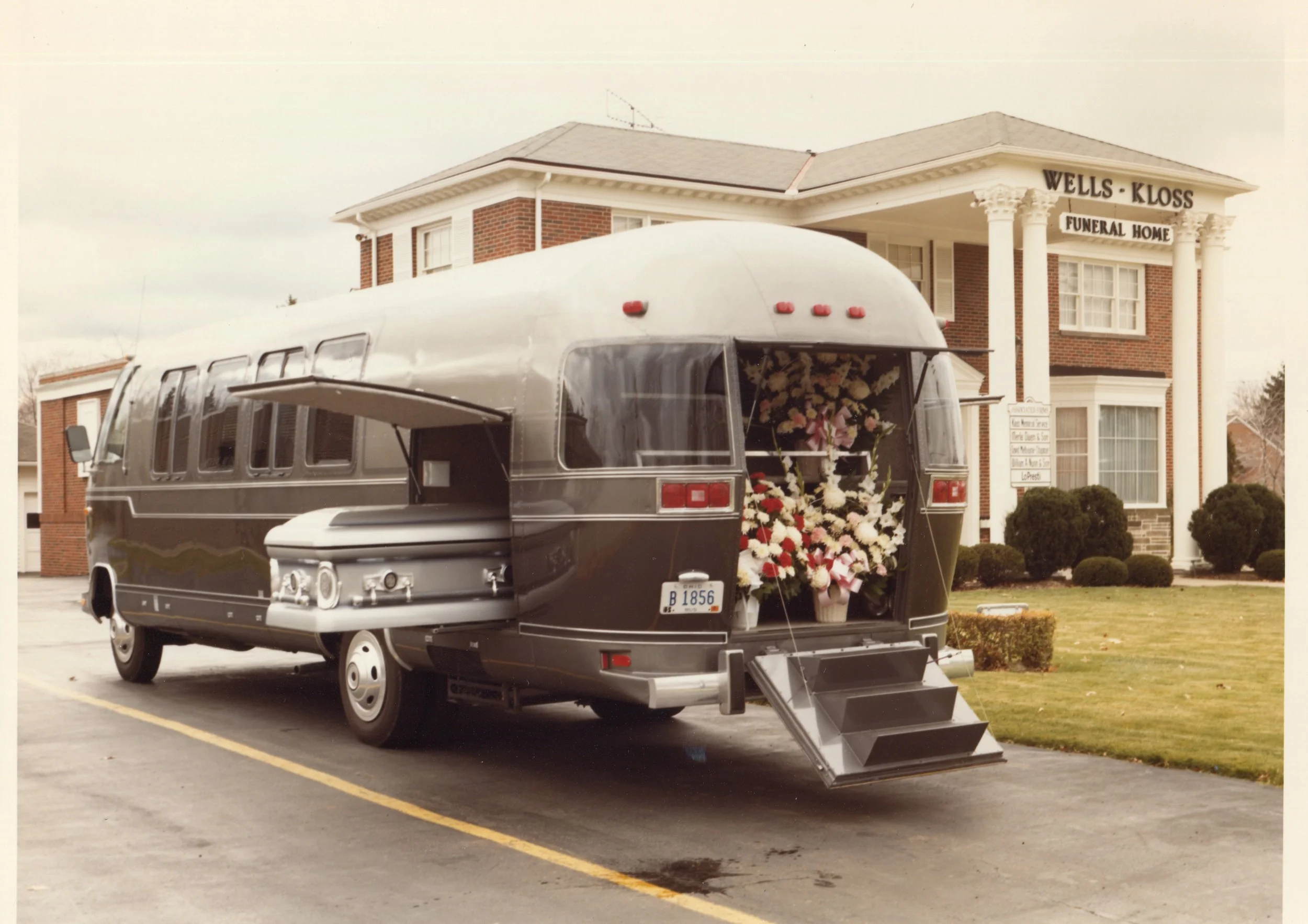  Here’s the exterior view of the Airstream Funeral Coach, circa 1982. It was a decent idea, having one vehicle that could take the place of several.The flowers went into the rear hatch area, as shown, while the casket went into the side carrier space