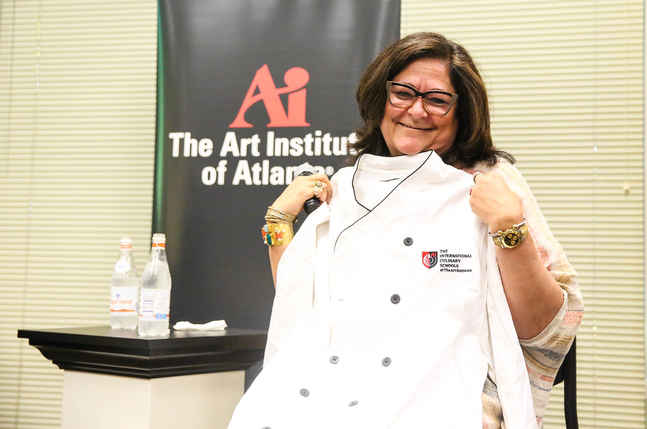  Fern revealed that she has a joy for cooking so she was gifted with an official Art Institute of Atlanta chef's jacket. 