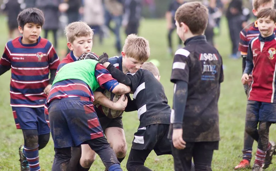 Rory Whitehead from Aireborough Under 10s taking the battle to near neighbours Otley 