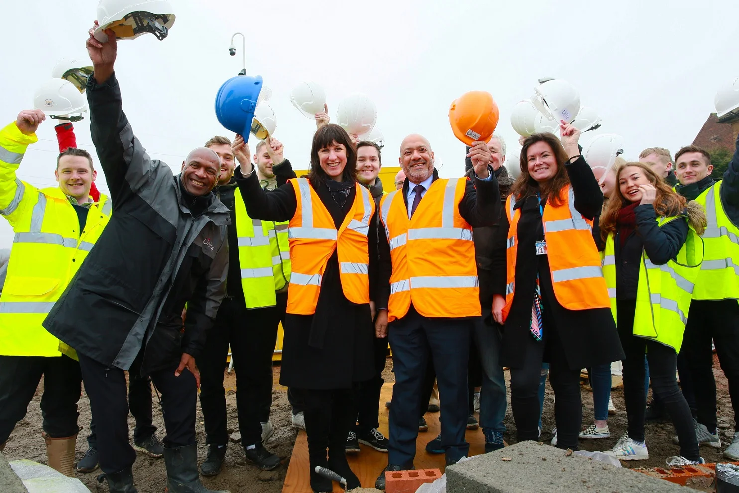 Leeds West MP Rachel Reeves (centre) celebrating progress on the Armley Ridge Road site with Unity chief executive Ali Akbor (centre right), project partners and students from Leeds Beckett University 