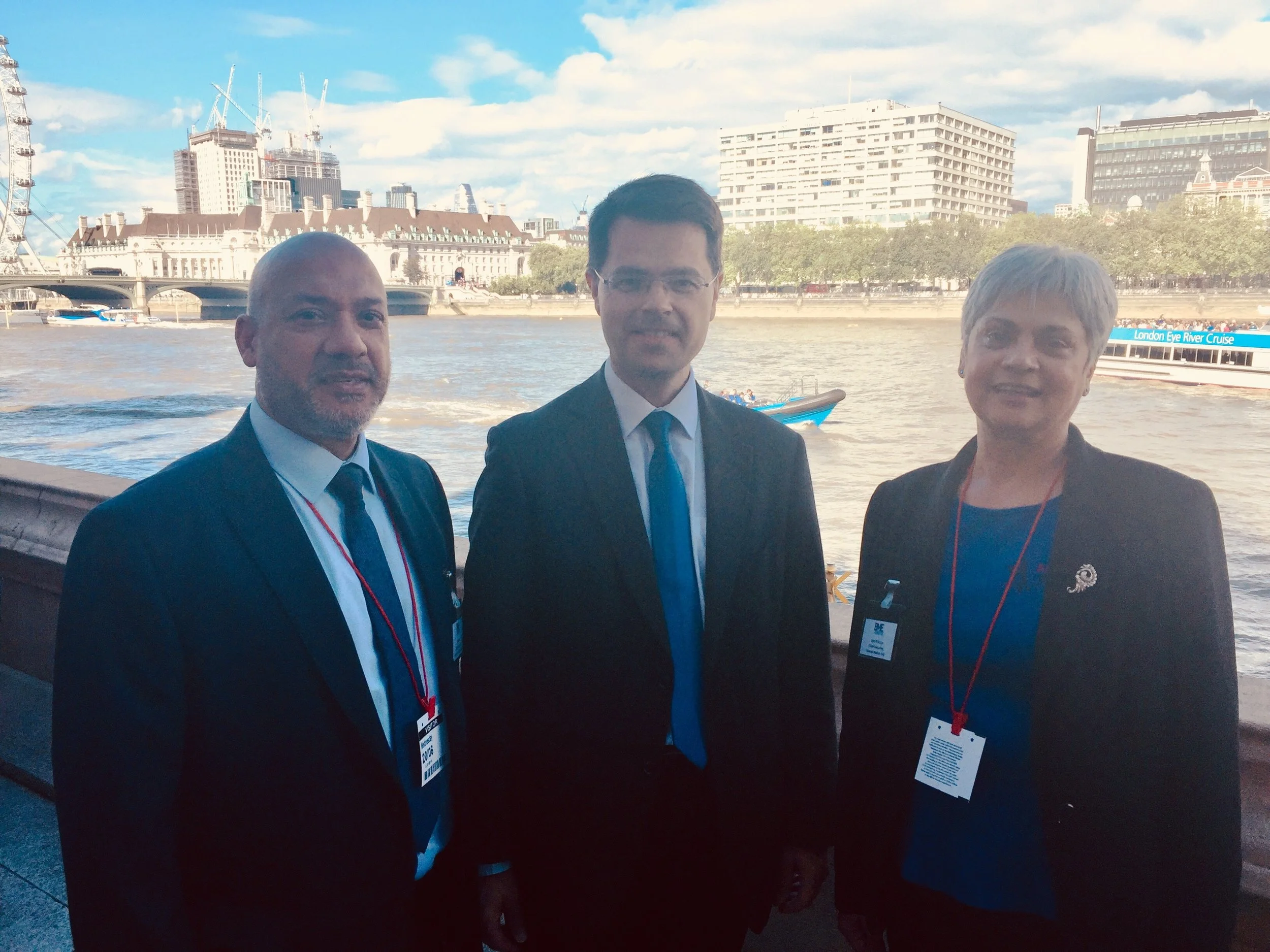 Housing Secretary James Brokenshire with Ali Akbor and Cym D'Souza from BME National
