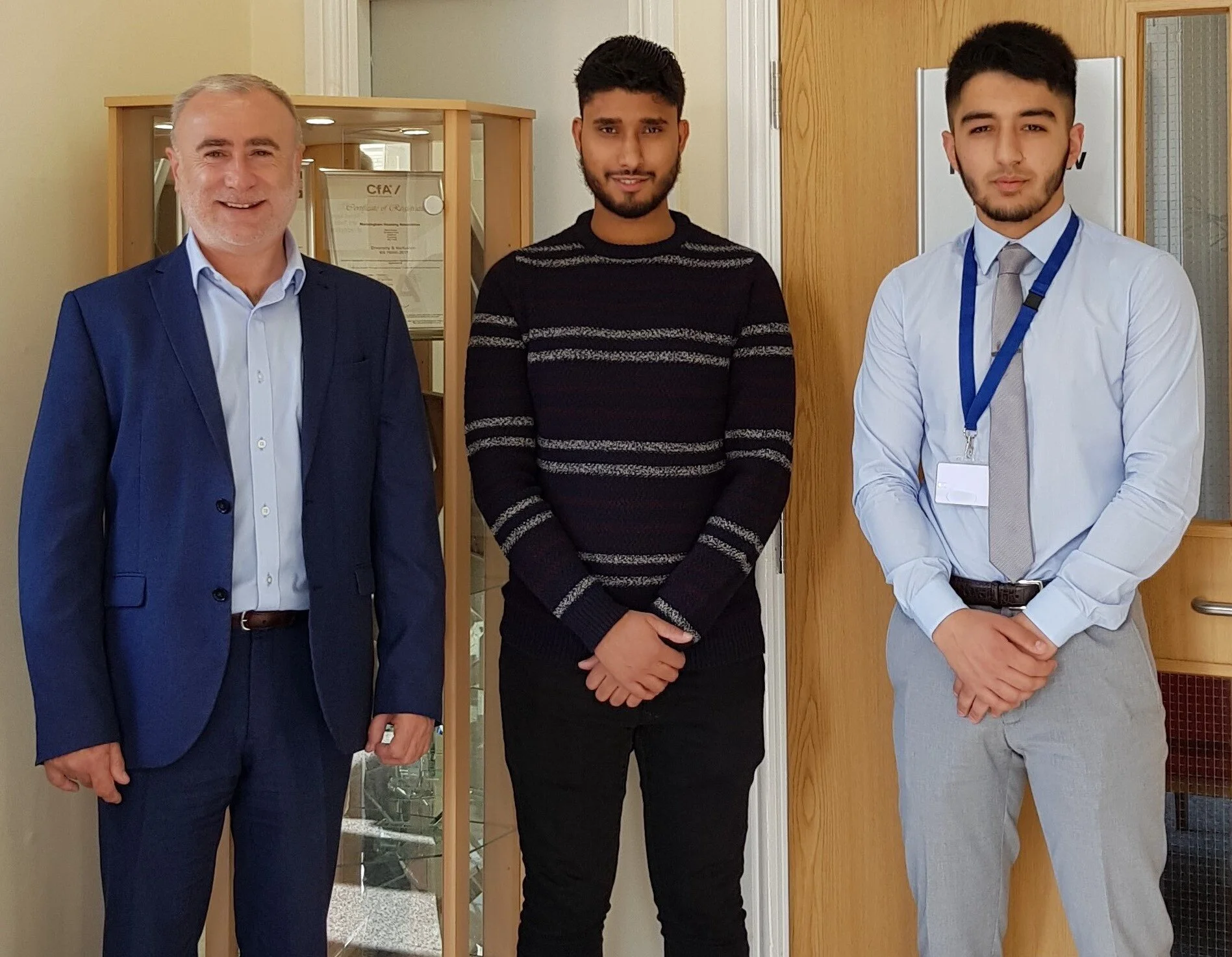 L to R: Lee Bloomfield, Manningham Housing Association Chief Executive, with apprentices Avtar Dhesi and Aanish Rehman
