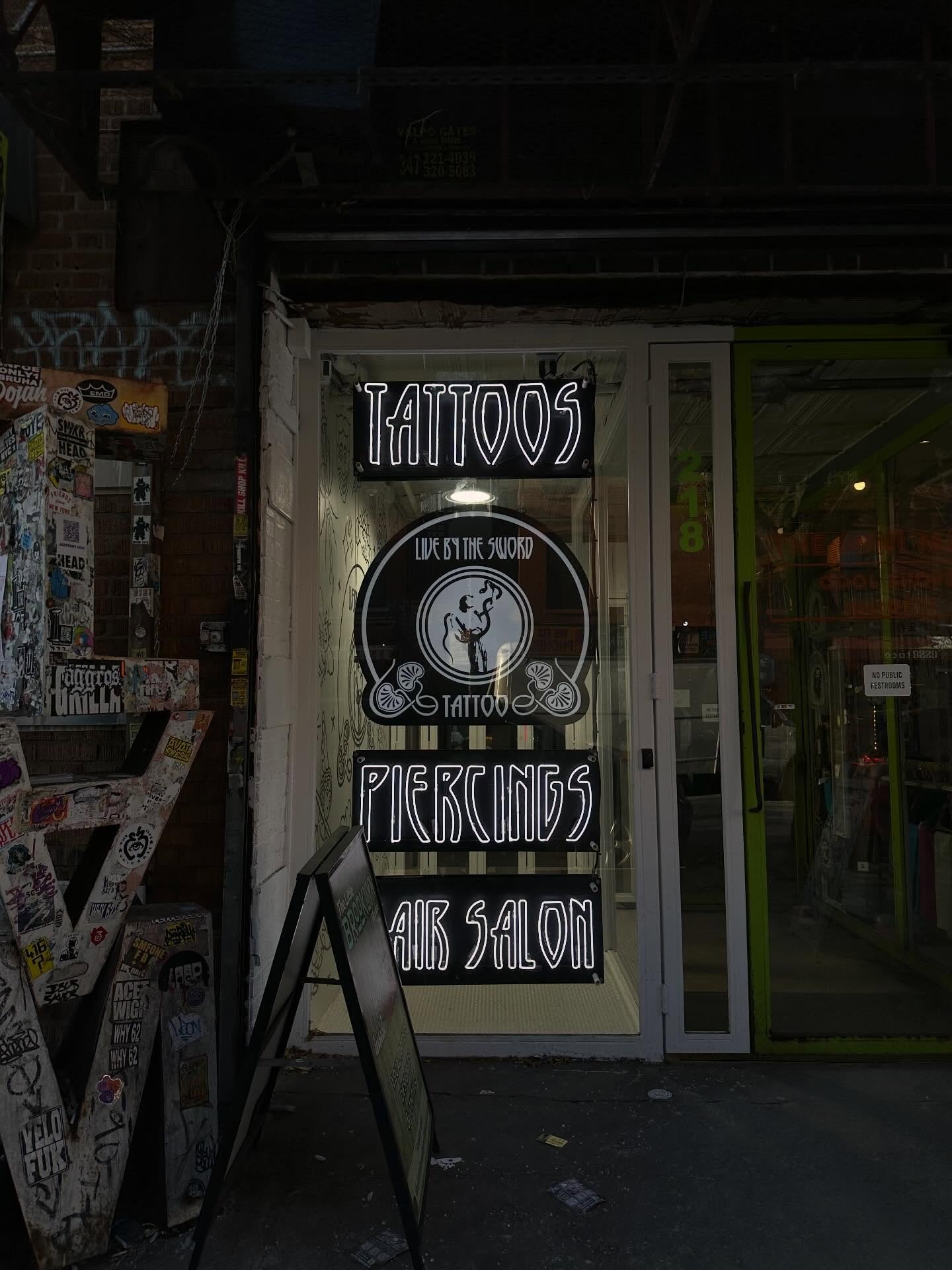 Awesome install day for Live by the Sword, Williamsburg! We&rsquo;ve got three new neon signs in the window of 218 Bedford. 

Always love making neon for them, and super thanks to @jamesakers2 for installing with me!!

@livebytheswordtattoo @livebyth