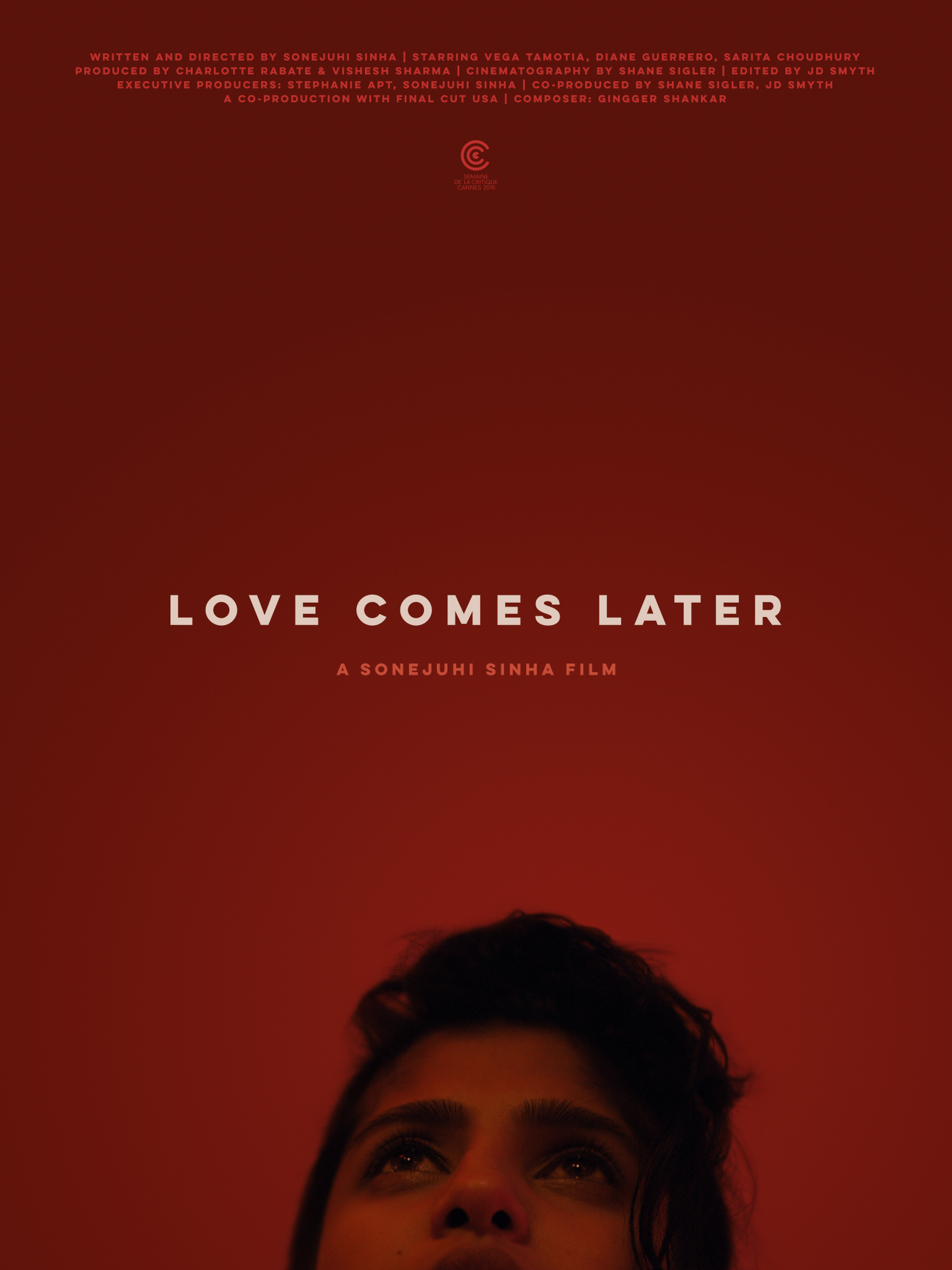 Movie poster for 'Love Comes Later' featuring a close-up of a young woman's face looking upward against a red background.