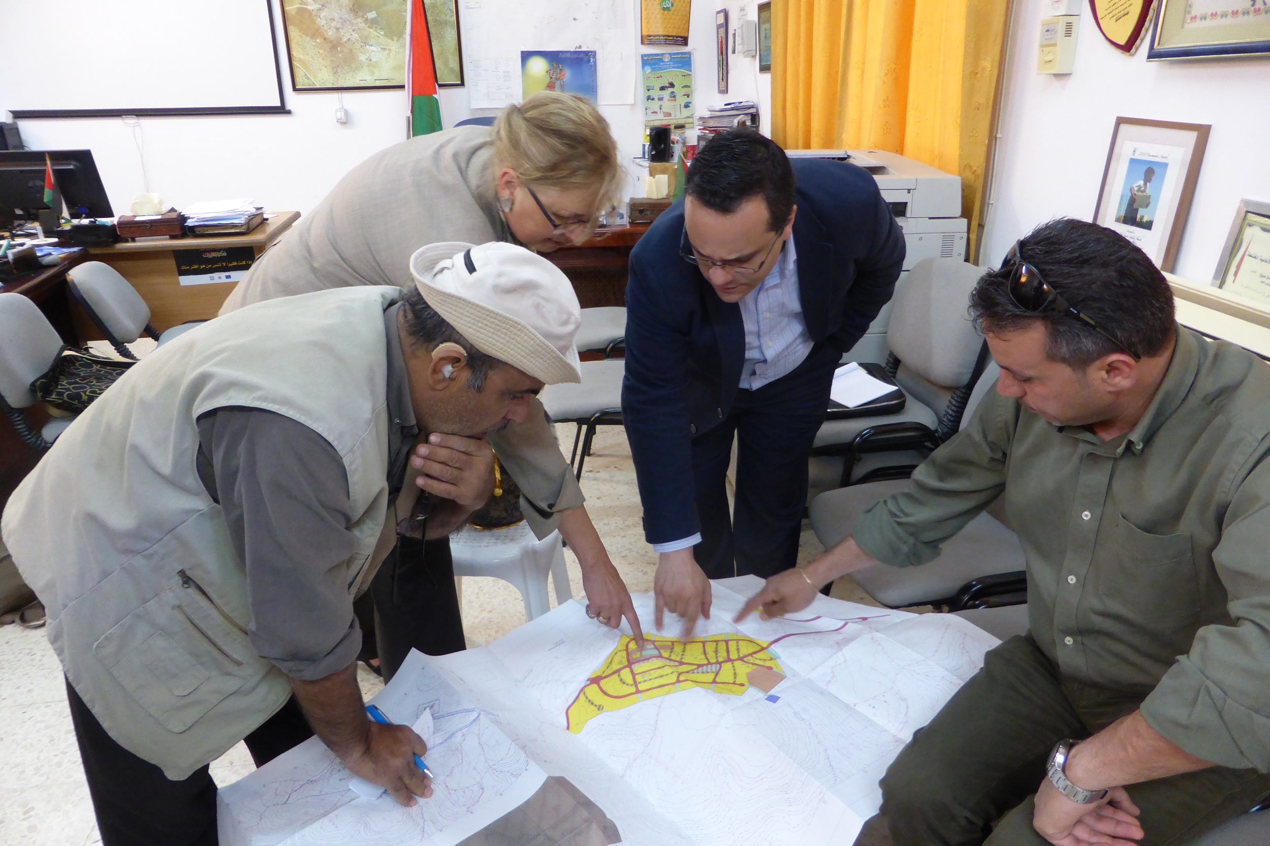 Donna Baranski-Walker with villagers discussing al Aqaba village's master plan. 