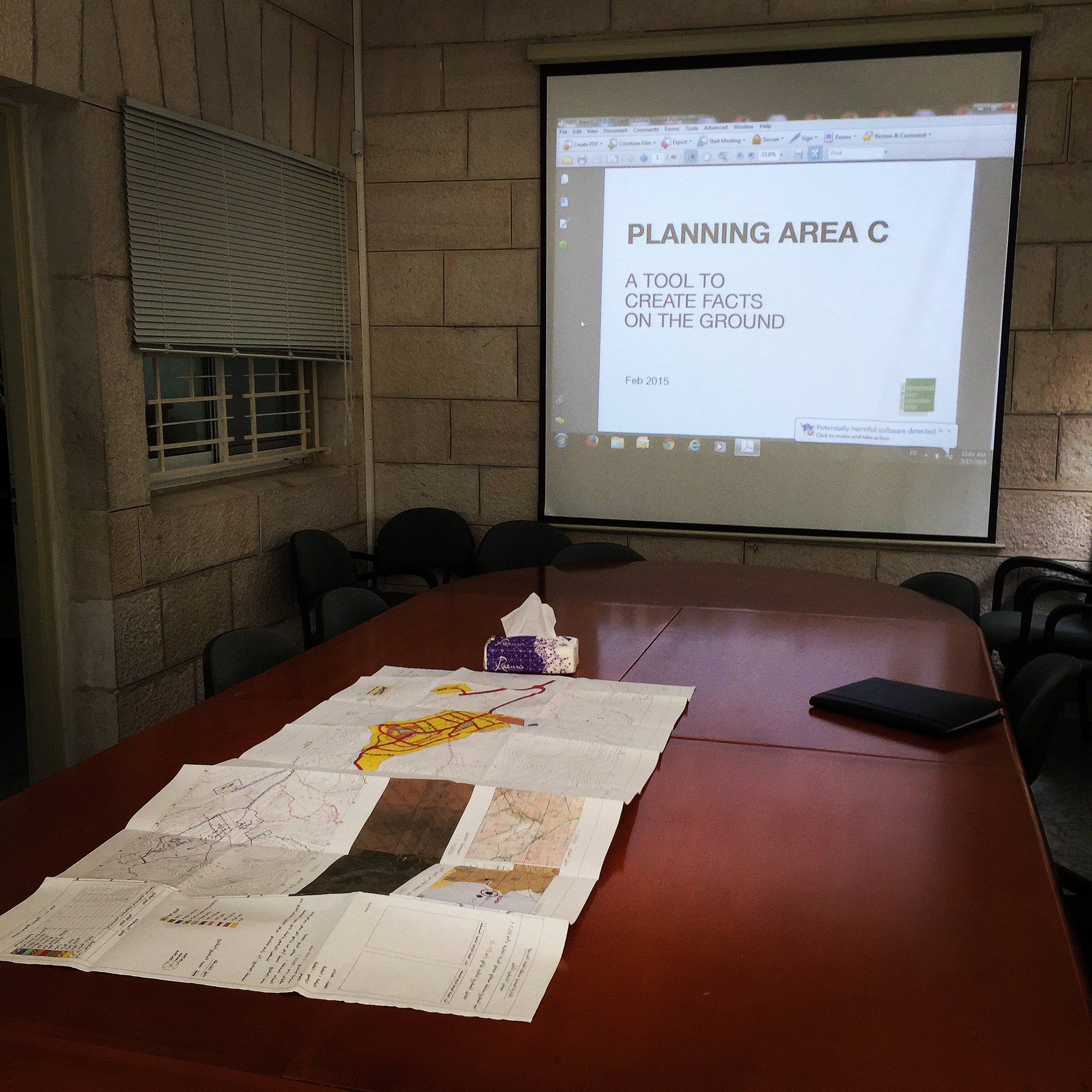 At the office of the International Peace and Cooperation Center in East Jerusalem