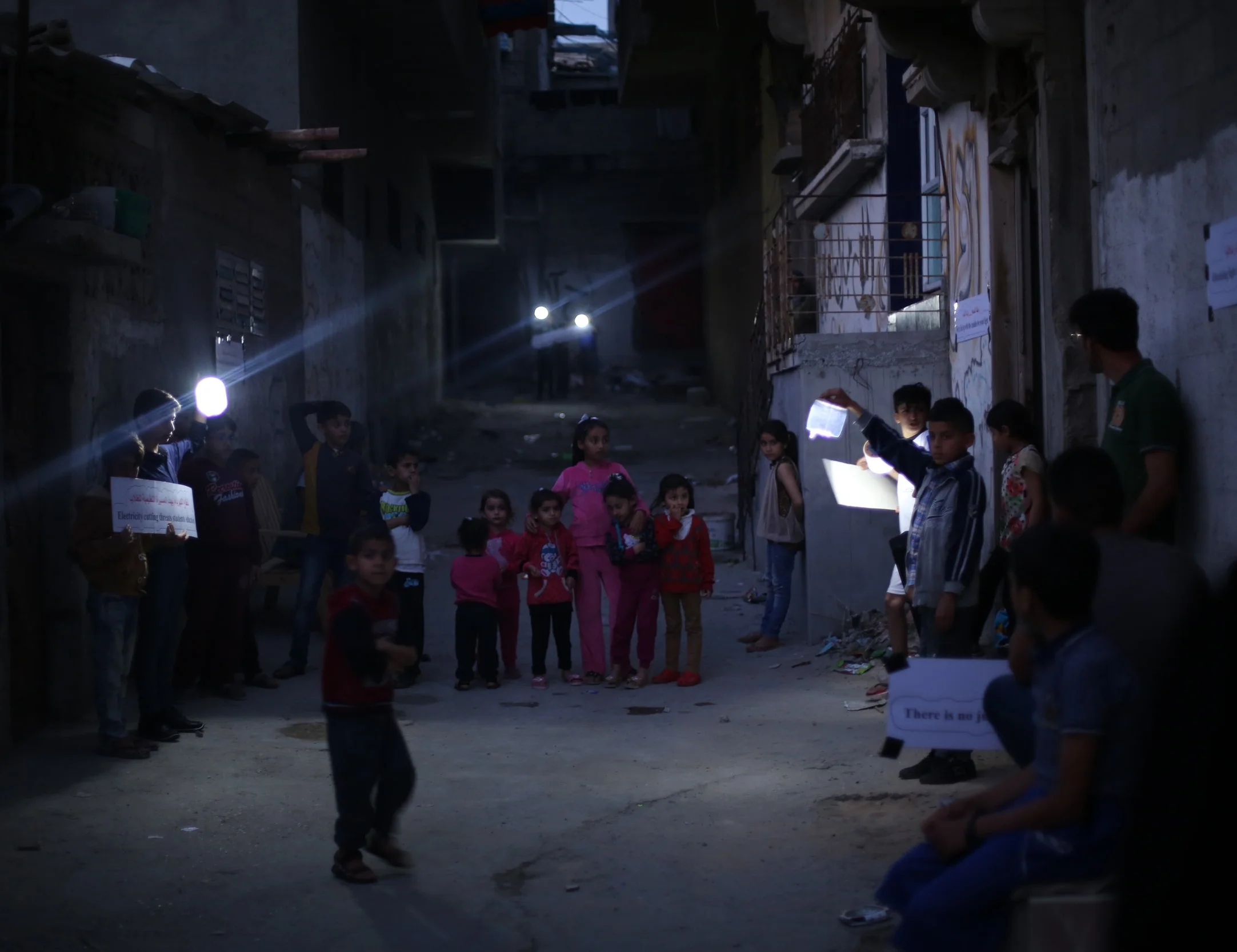 Families gather with their lights together every Wednesday during Nur al-Amal