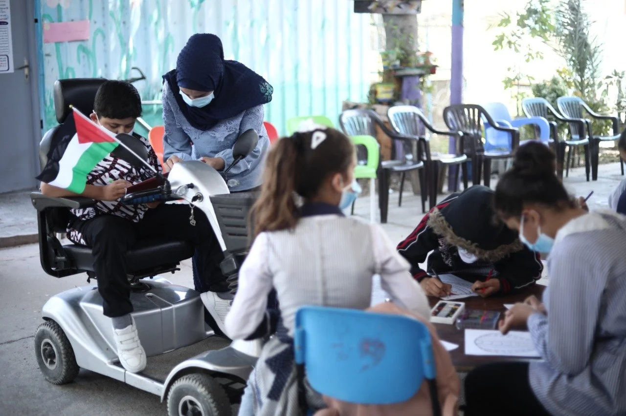 Mahmoud and his class.jpeg