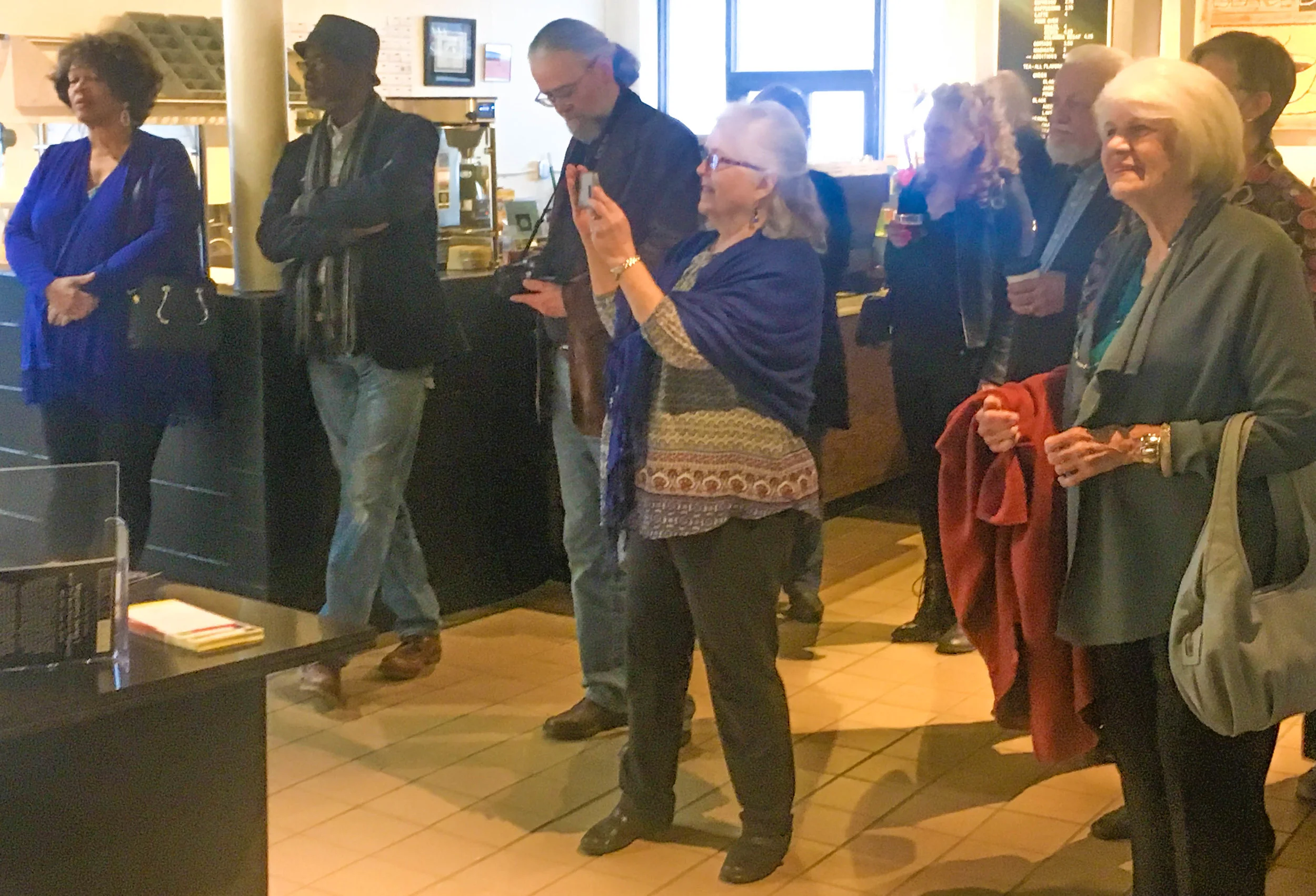 Artist Lucille Nawara (center)