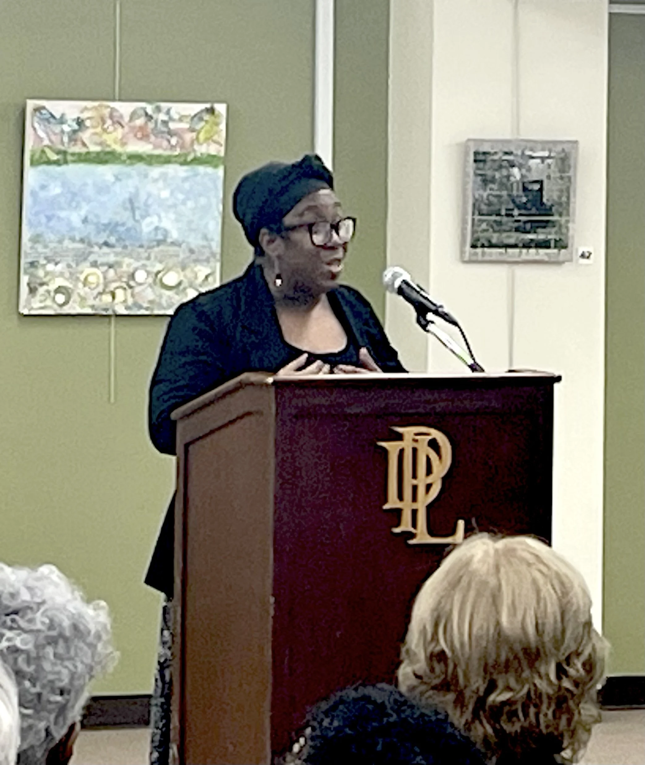 Juror Valerie Jenkins addressing those attending the opening reception...