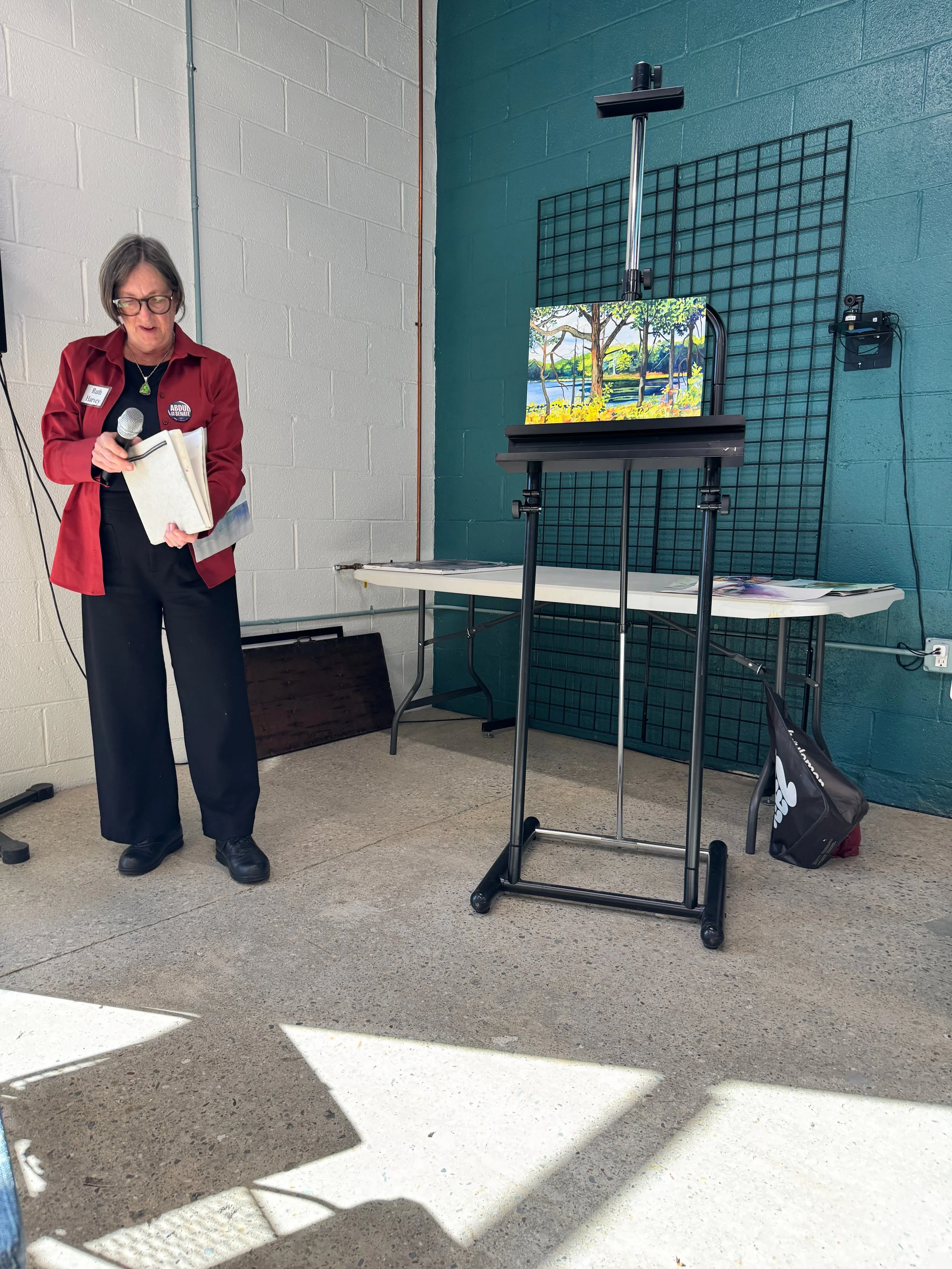  Ruth Harvey presented high-value water colors painted en plein air at a retreat in Hastings, Michigan…and a squirrel done in ball-point and colored pencil. 