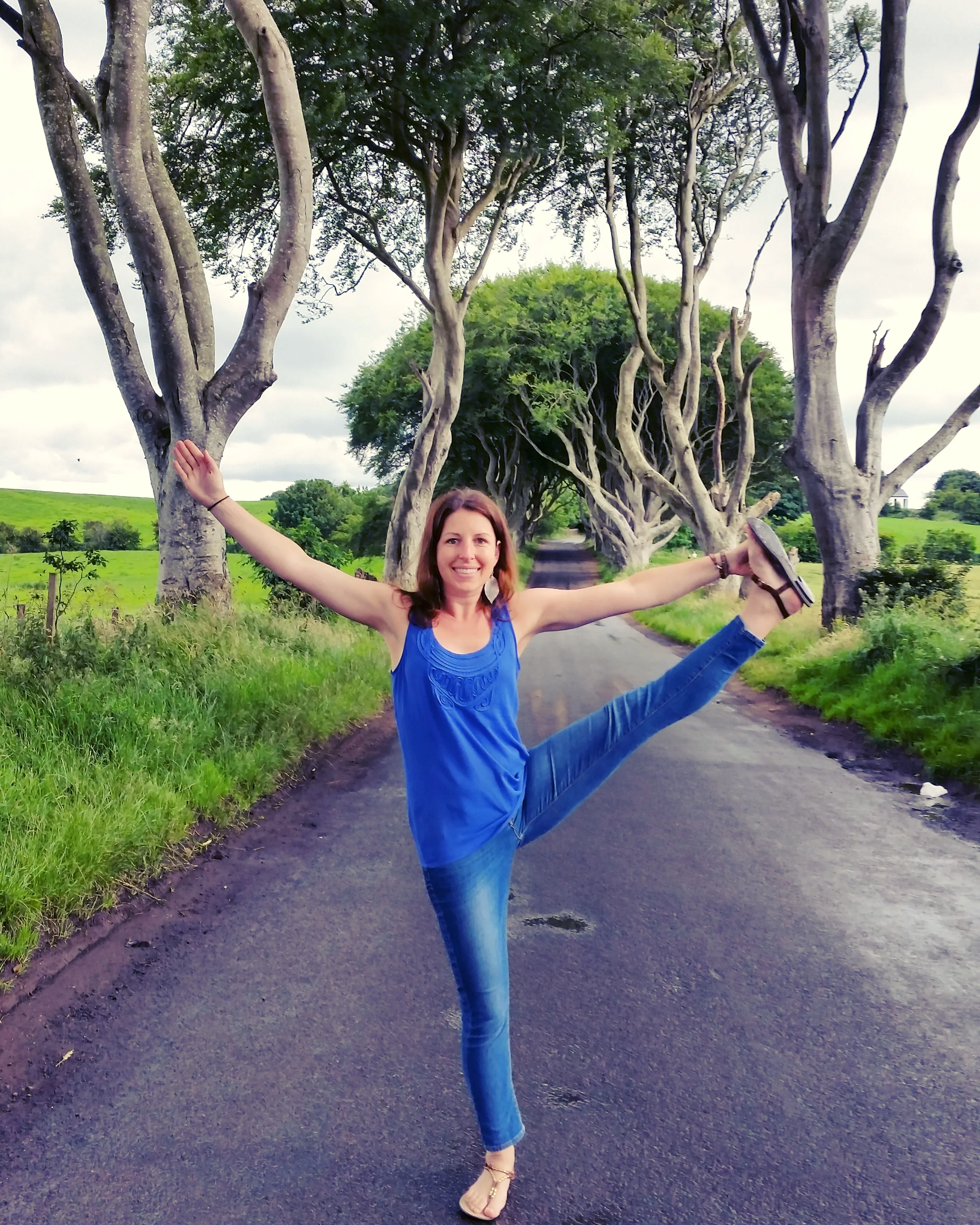 Tree pose at the Dark Hedges in Northern Ireland