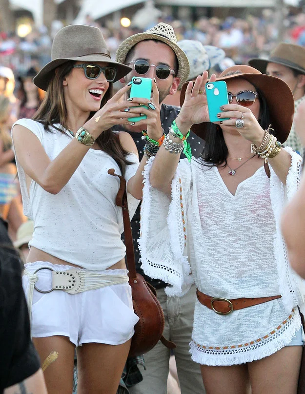 Famous people taking selfies at Coachella.