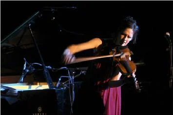 The violinist Jenny Scheinman at Le Poisson Rouge. Photo by Chang W. Lee in 2010.