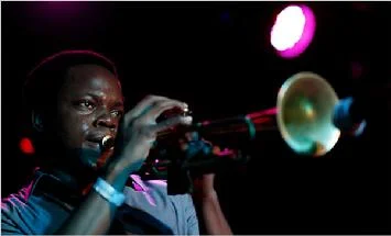 The trumpeter Ambrose Akinmusire playing with his quintet at Sullivan Hall, part of the sixth NYC Winter Jazzfest shows in Greenwich Village. Photo by Joe Kohen, NY Times in 2010.