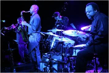 Christian McBride in back with, from left, Terence Blanchard, Branford Marsalis and the bandleader Jeff (Tain) Watts. (Hiroyuki Ito for The New York Times in 2009)