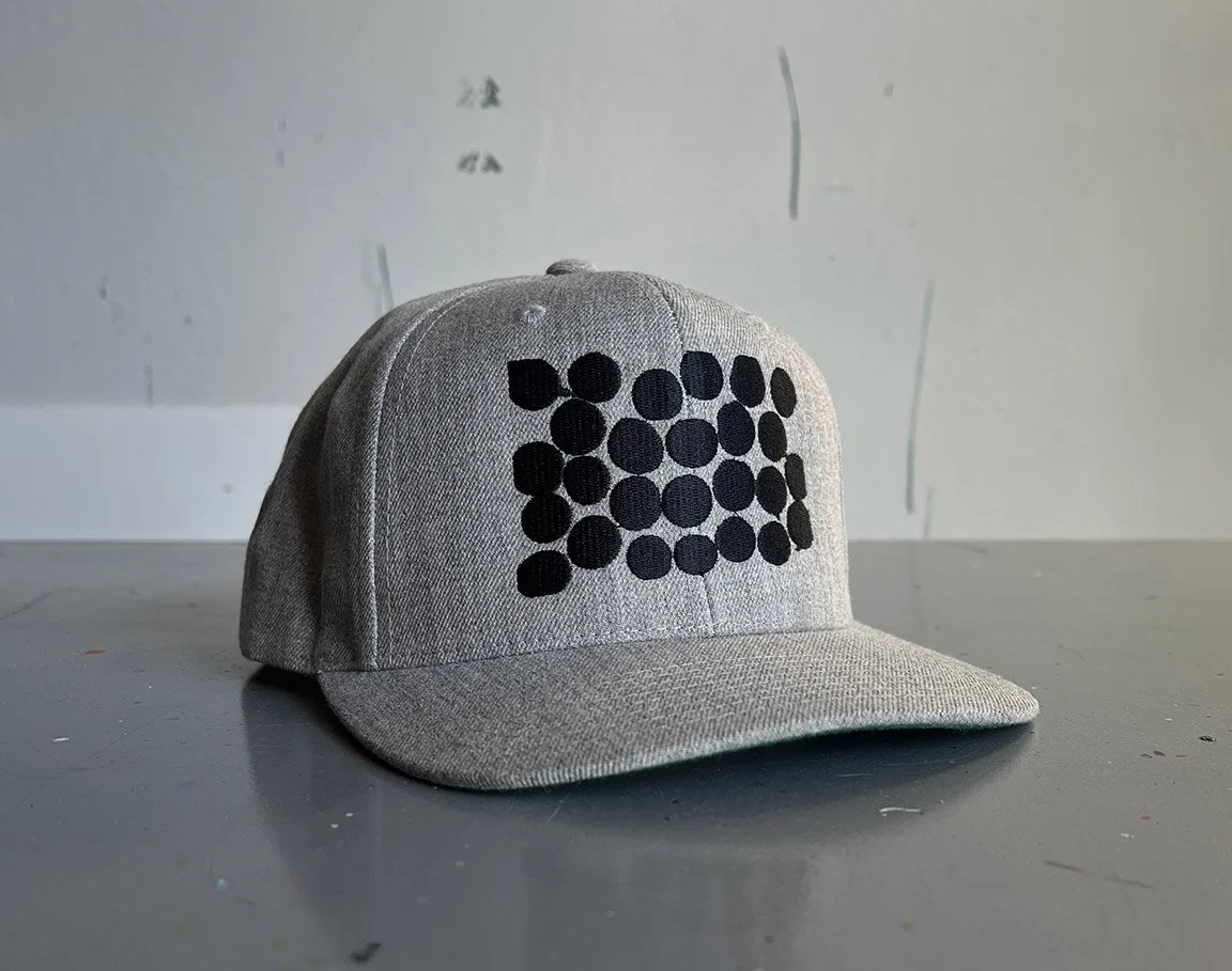 BLACKDOTS HAT TABLE.jpg