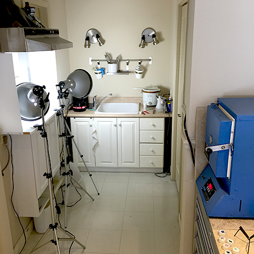 I photograph all of my work in the studio. The enamelling kiln is on the right, and the clean up area is used all the way through the process.