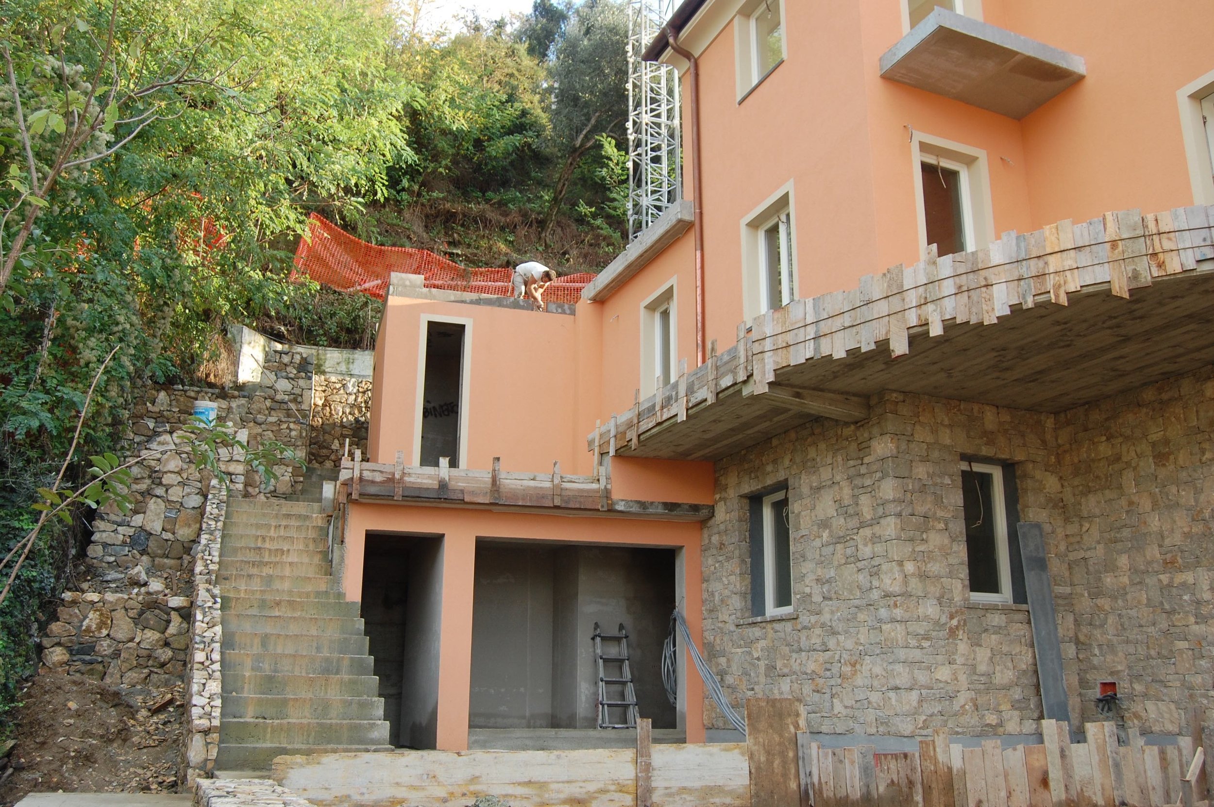 Entrance side, showing the main walkway up to parking and down to the town center