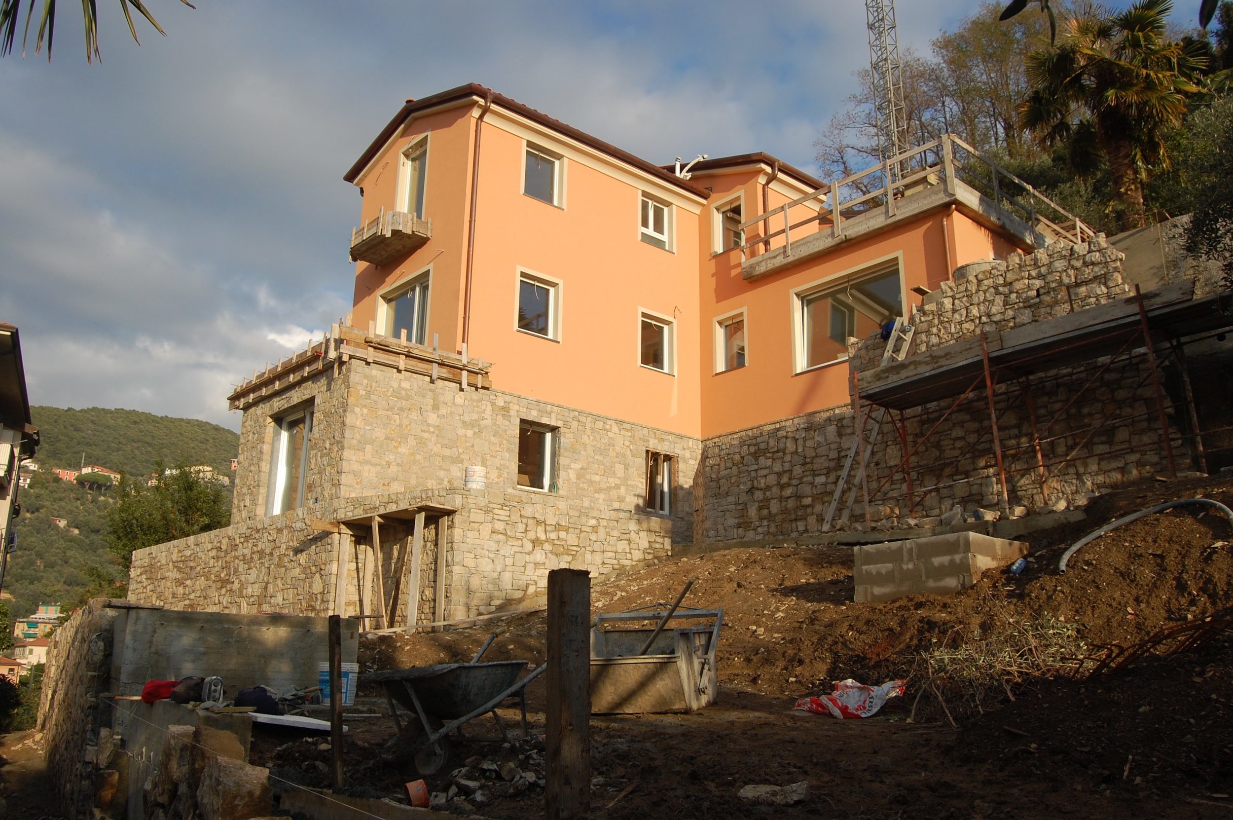 The garden walls and walkways are GETTING a stunning stone face