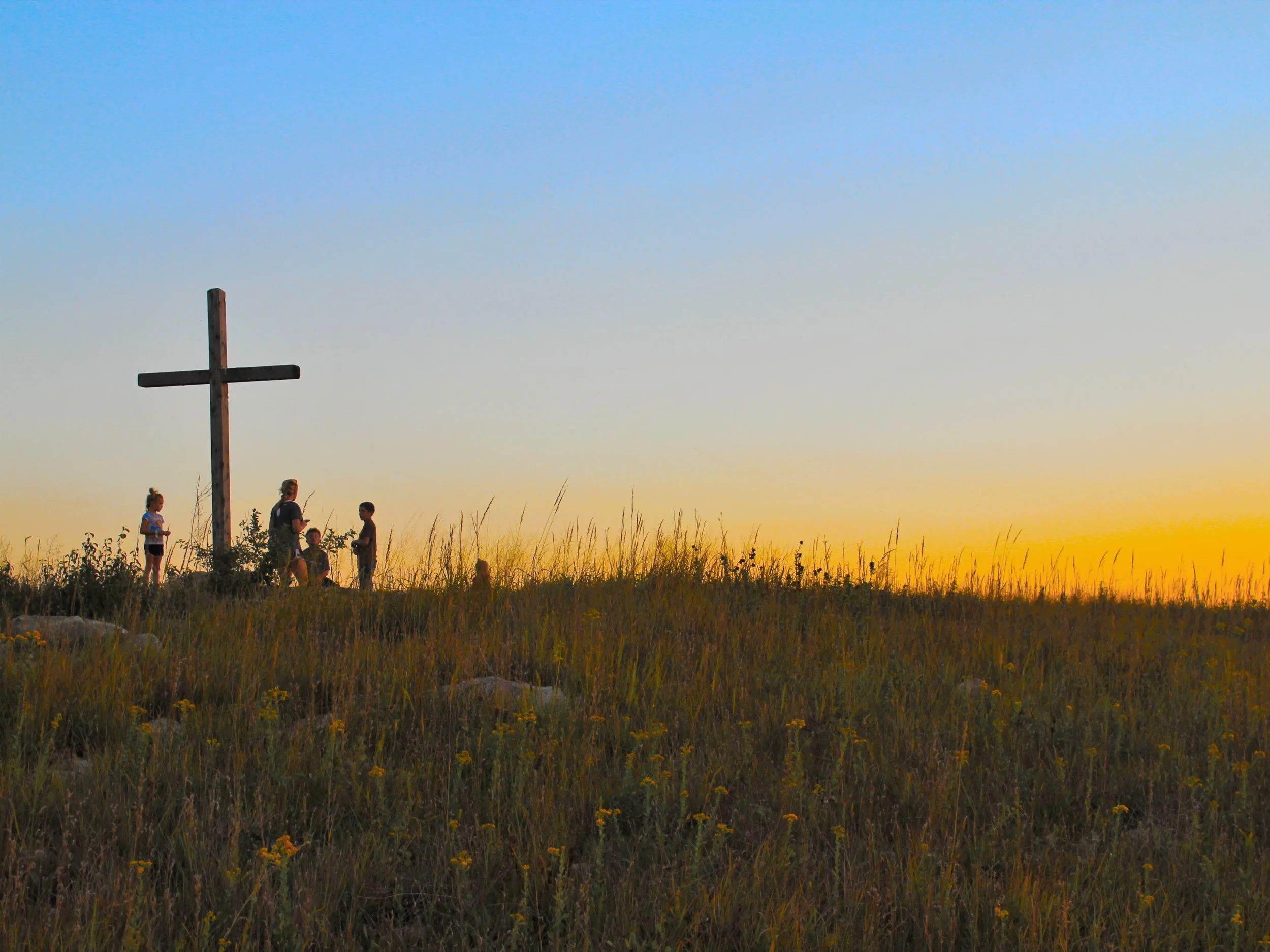 A photo of campers playing atop Hi-Y Hill, named after the original YMCA clubs that first used the camp.