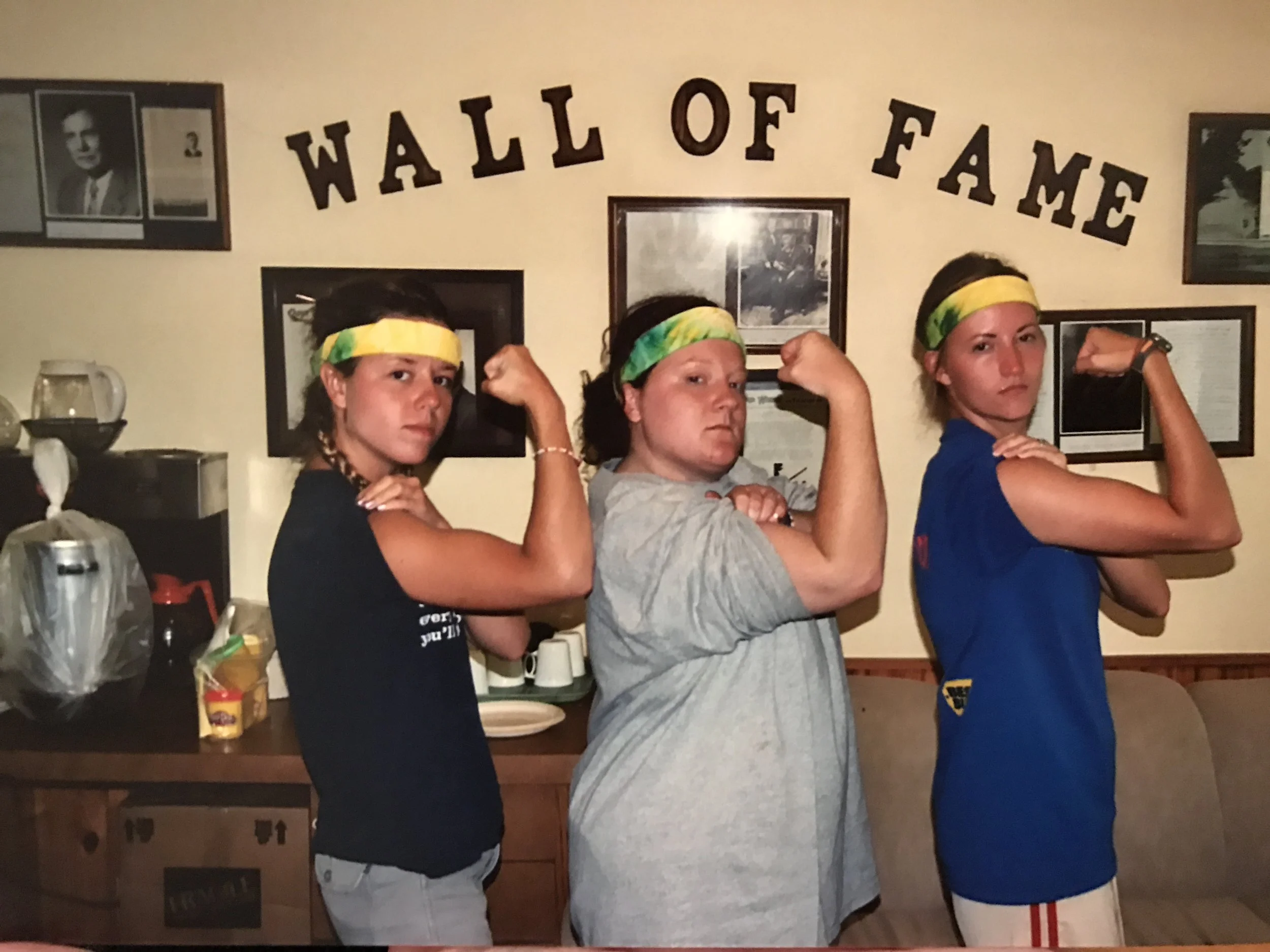 Sarah and fellow staff members, Jessica and jill, flex their muscles for the camera in jones lodge.