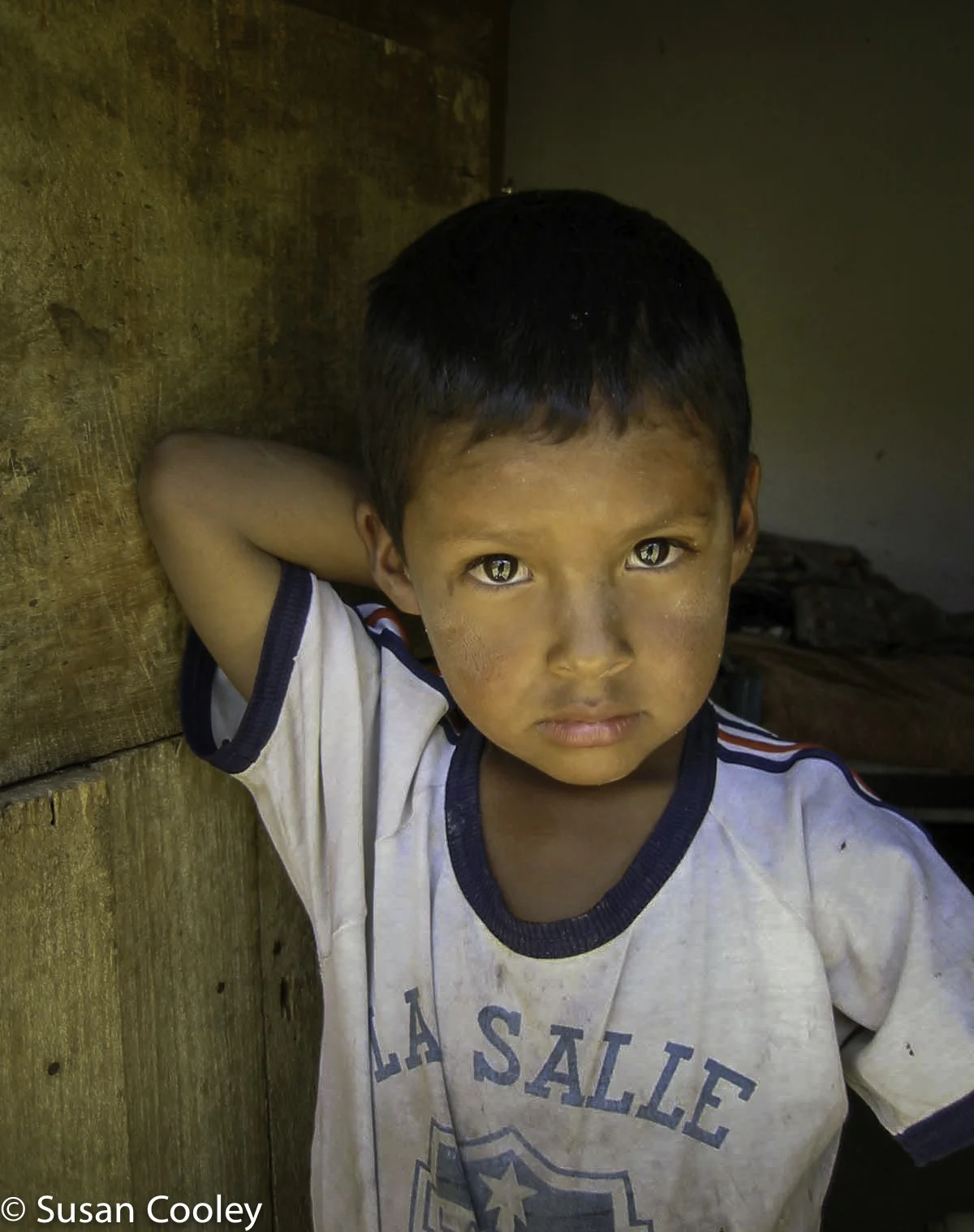 Bolivian Boy in the doorway.