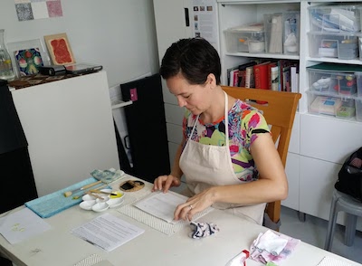 Practicing handling the paper and registering the corners. 