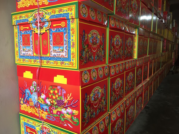 Boxes for the afterlife filled with essentials. Someone even mentioned that a paper kettle is included! 