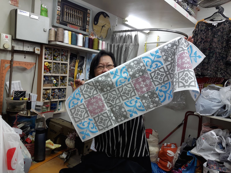 Seamstress Ms. Ng from Malaysia loves seeing what students create from her hard work! 