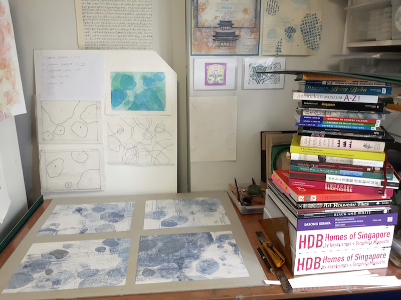 Prints about to come out of the drying 'stack' - having been pressed between cardboard for several days. 