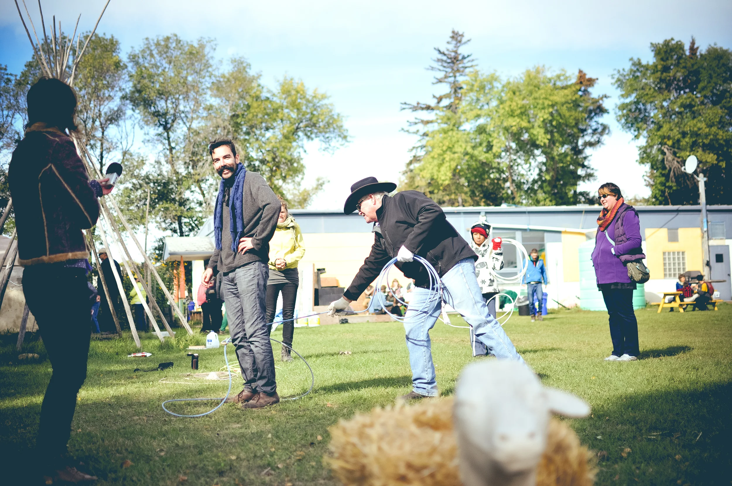 Here's Bill demonstrating how to rope livestock by the feet... err hooves.