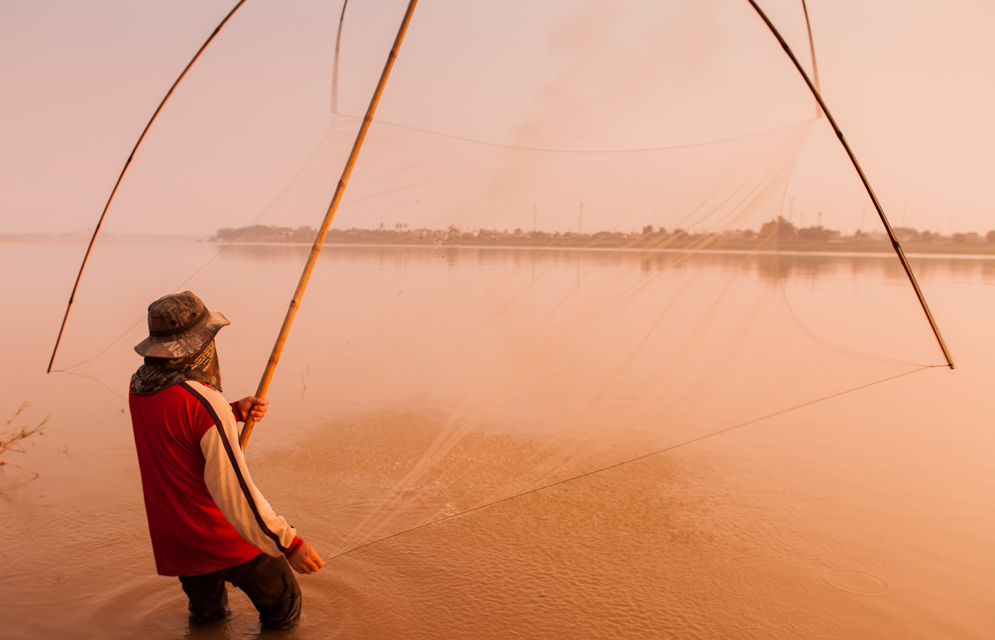 Fisherman on the Mekong in Laos