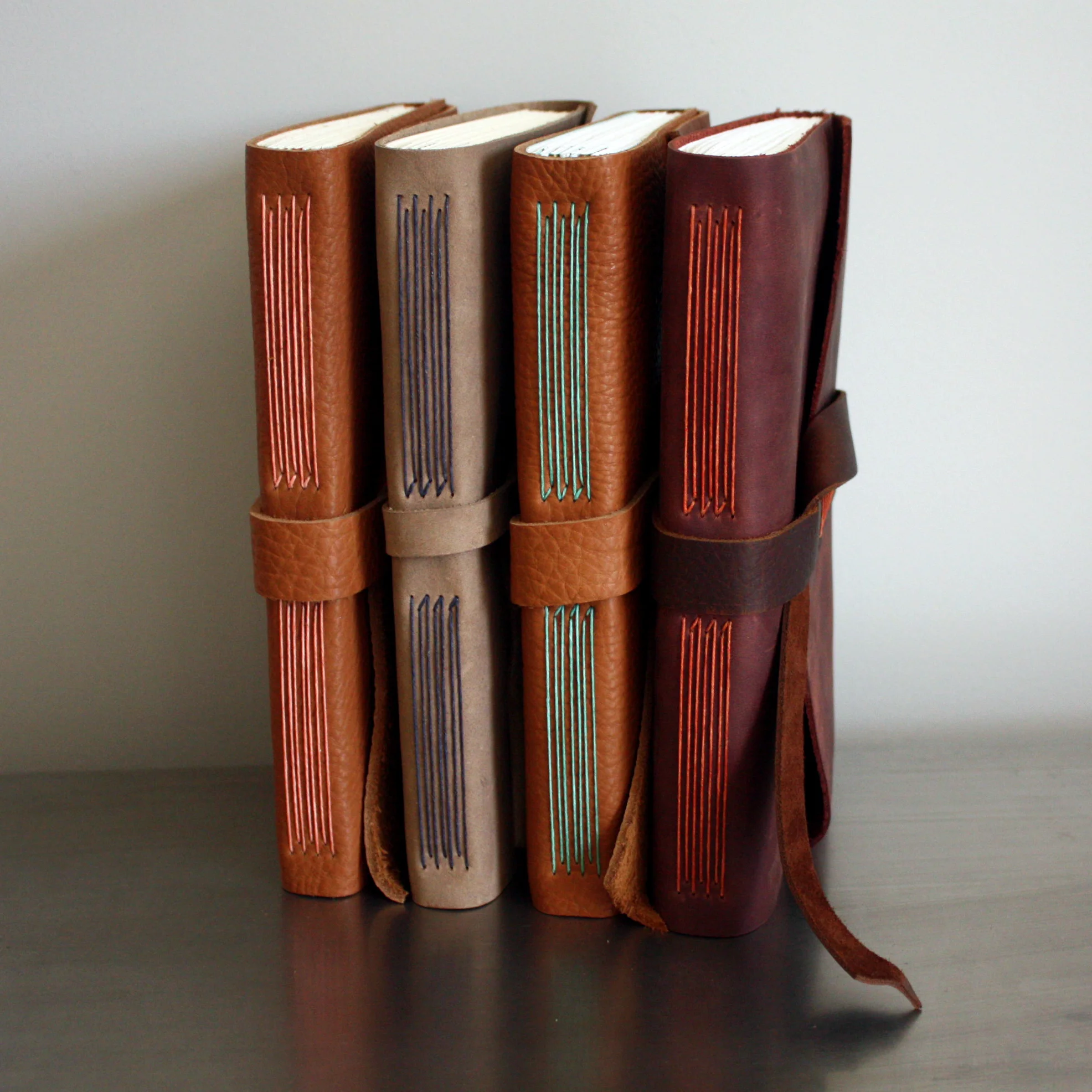 four leather journals.jpg