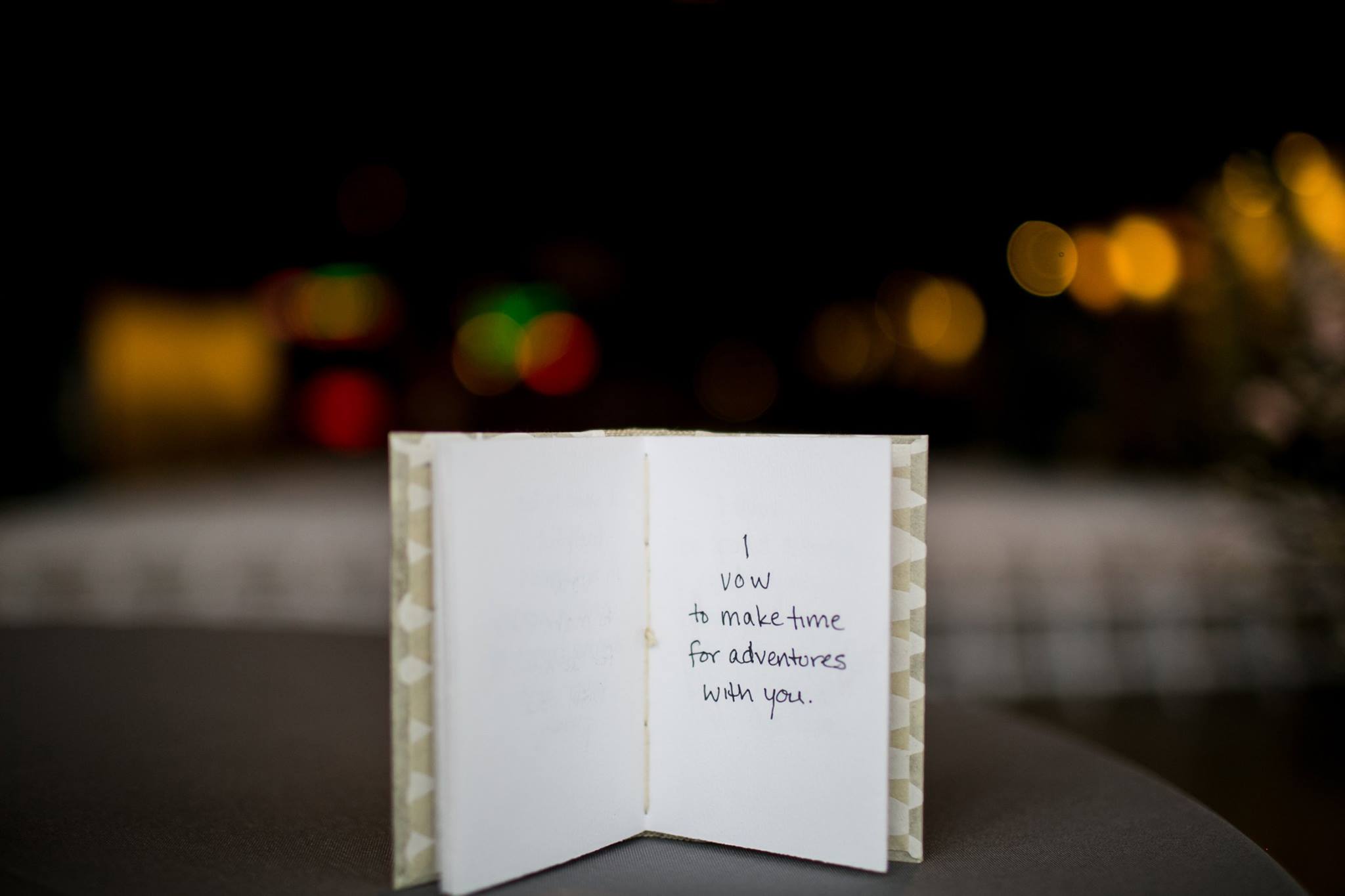 A handbound book filled with wedding vows