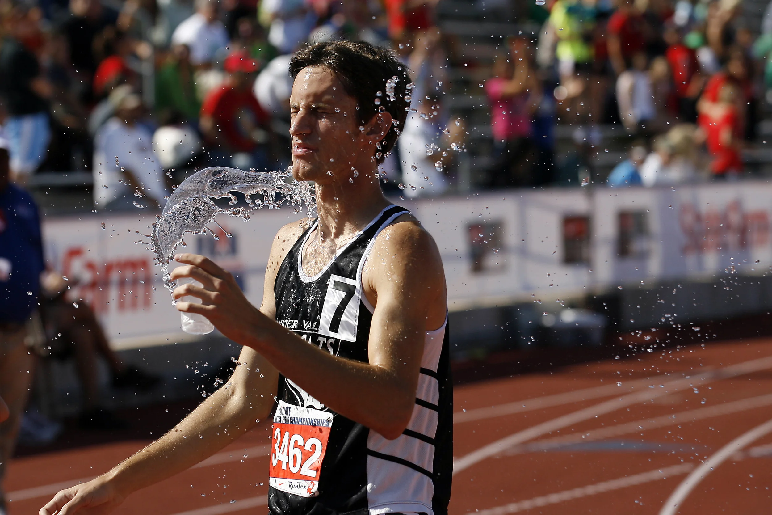  Water Valley High School's Dylan Doss cools off after crossing the finish line in the Class 1A boys 3200-meter run Friday morning at the State Track and Field Meet in Austin. Doss finished in first place with a time of 9:35.13. 