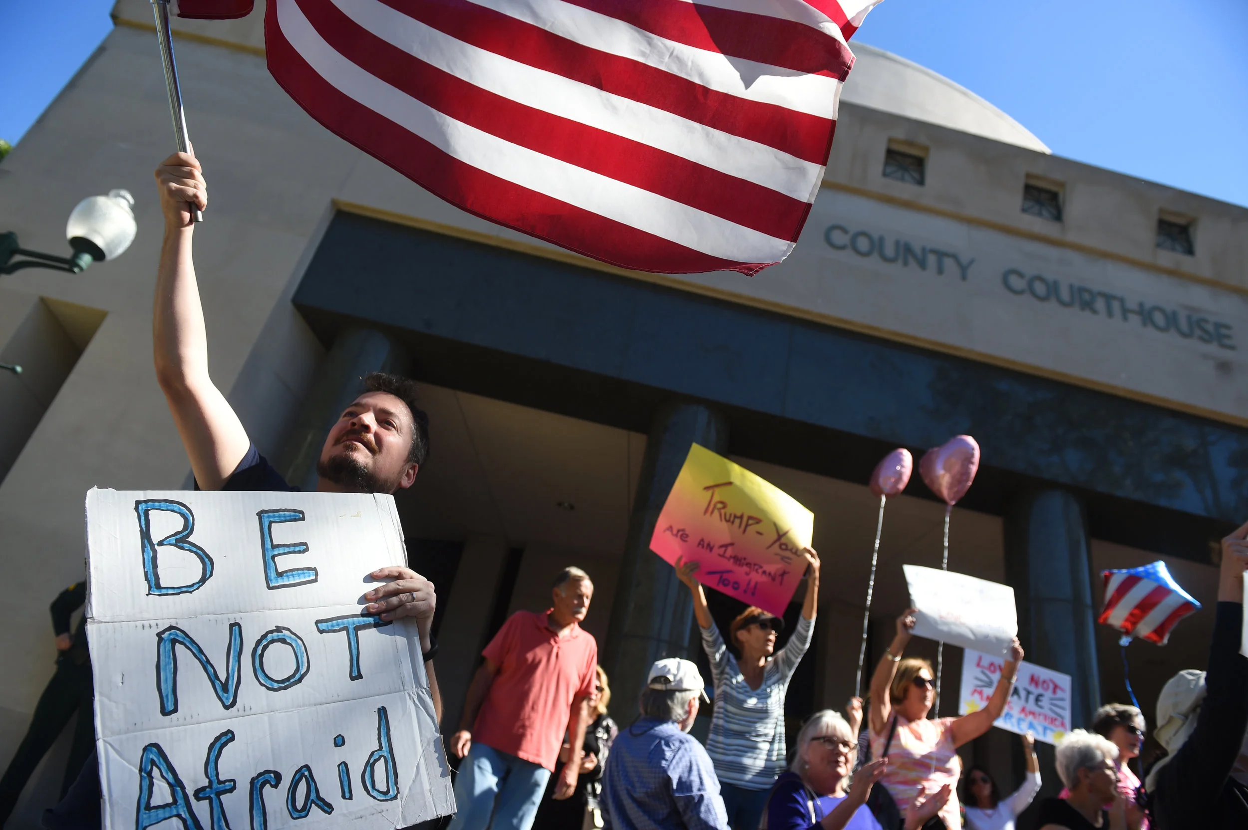  Paul Blake, of Vero Beach, participates in a demonstration with about 100 other local citizens voicing their opposition to President Donald Trump's immigration and refugee ban on Tuesday, Jan. 31, 2017, on the steps of the Indian River County Courth