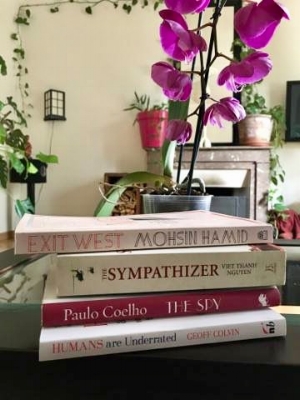 Pictured: Mohsin Hamid's Exit West , Viet Thanh Nguyen's The Sympathizer , Paulo Coelho's The Spy , and Geoff Colvin's Humans Are Underrated .