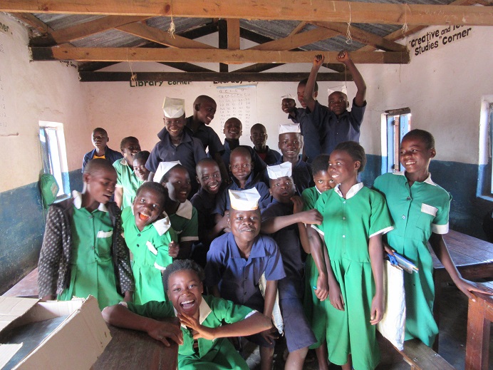 This is group of children in about the 3rd or 4th grade, and they are all around 14-15 years old. CHildren there start school much later than we are used to in the United States. 