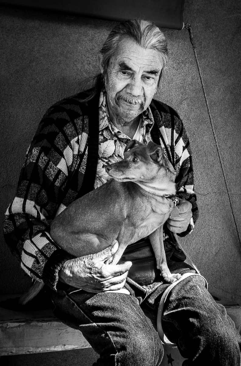 Old Hispanic Man and His Dog