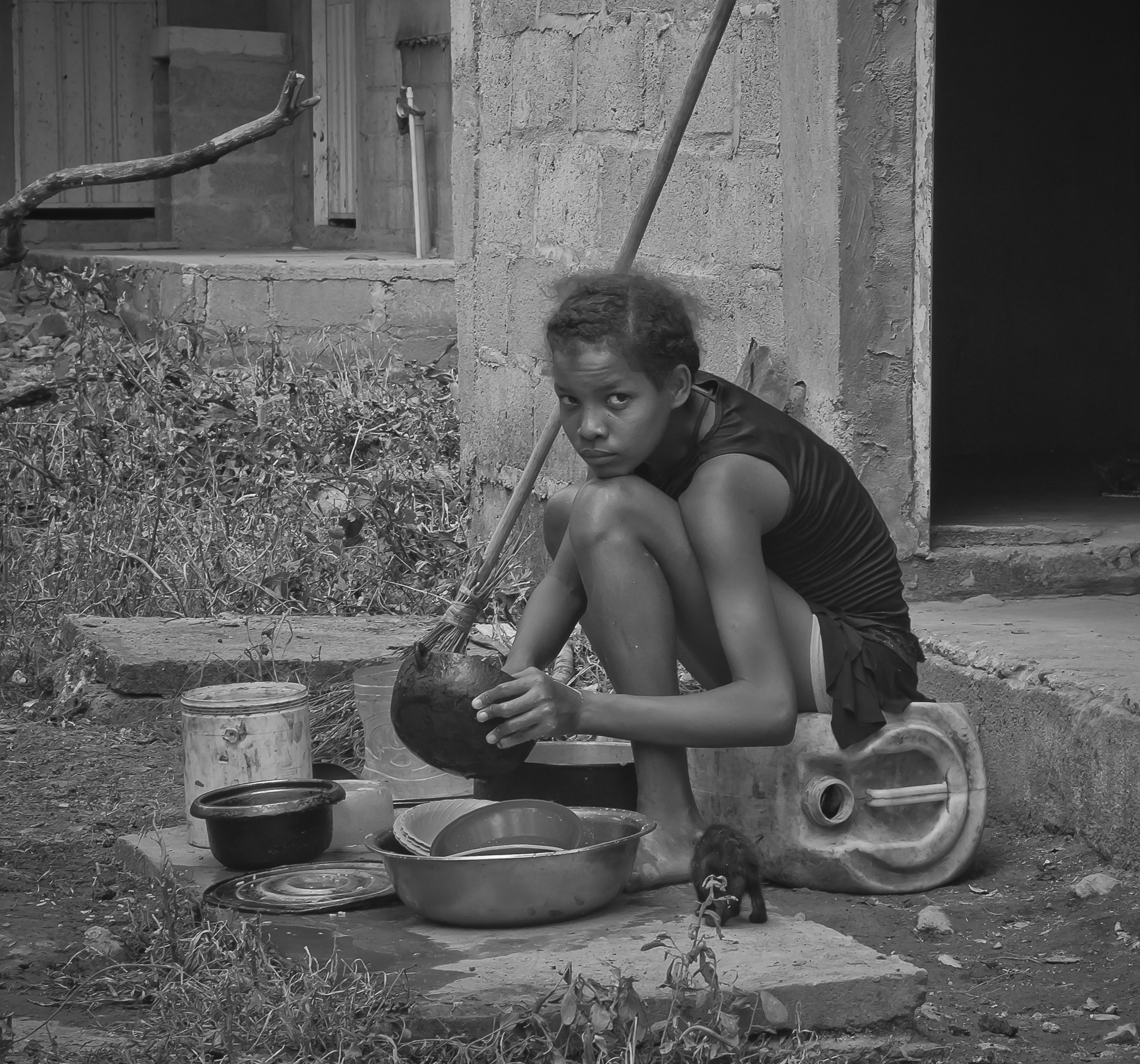  In this scene, I was impressed by how the transition to a reinvigorated peaceful environment influences the town life.&nbsp; This young girl adapted her kitchen outside of her house.&nbsp; She improvised a dish-washer with rustic tools, It seems she