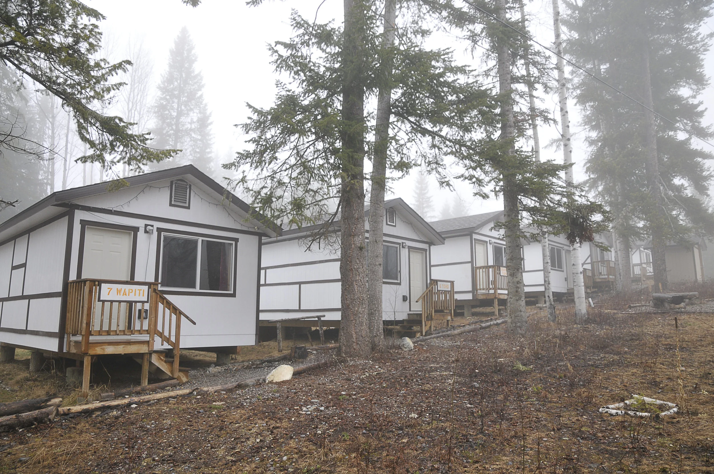 Cabins on a misty morning.
