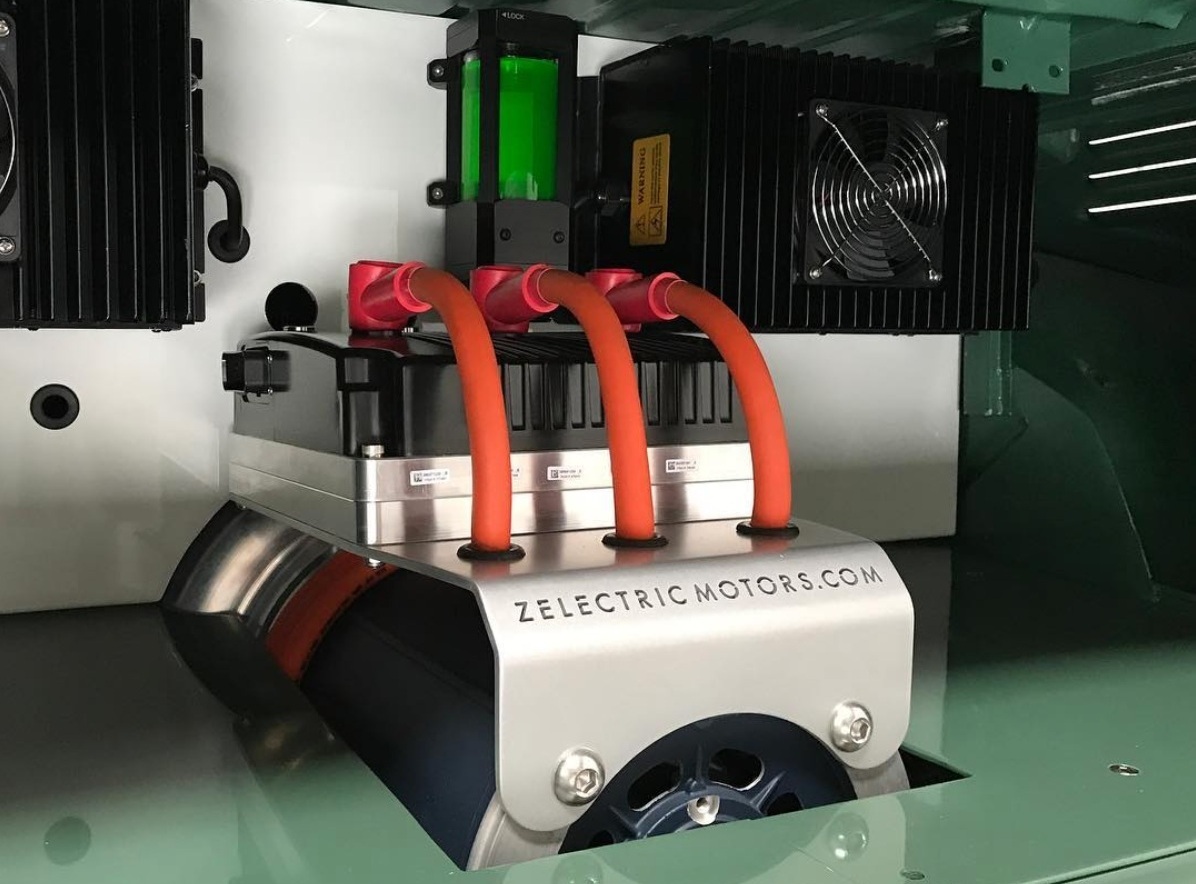 No more rattling tubes, pulleys, and oozing layers of gunk. The VW Microbus motor bay now sports minimalist design and delivers high performance.