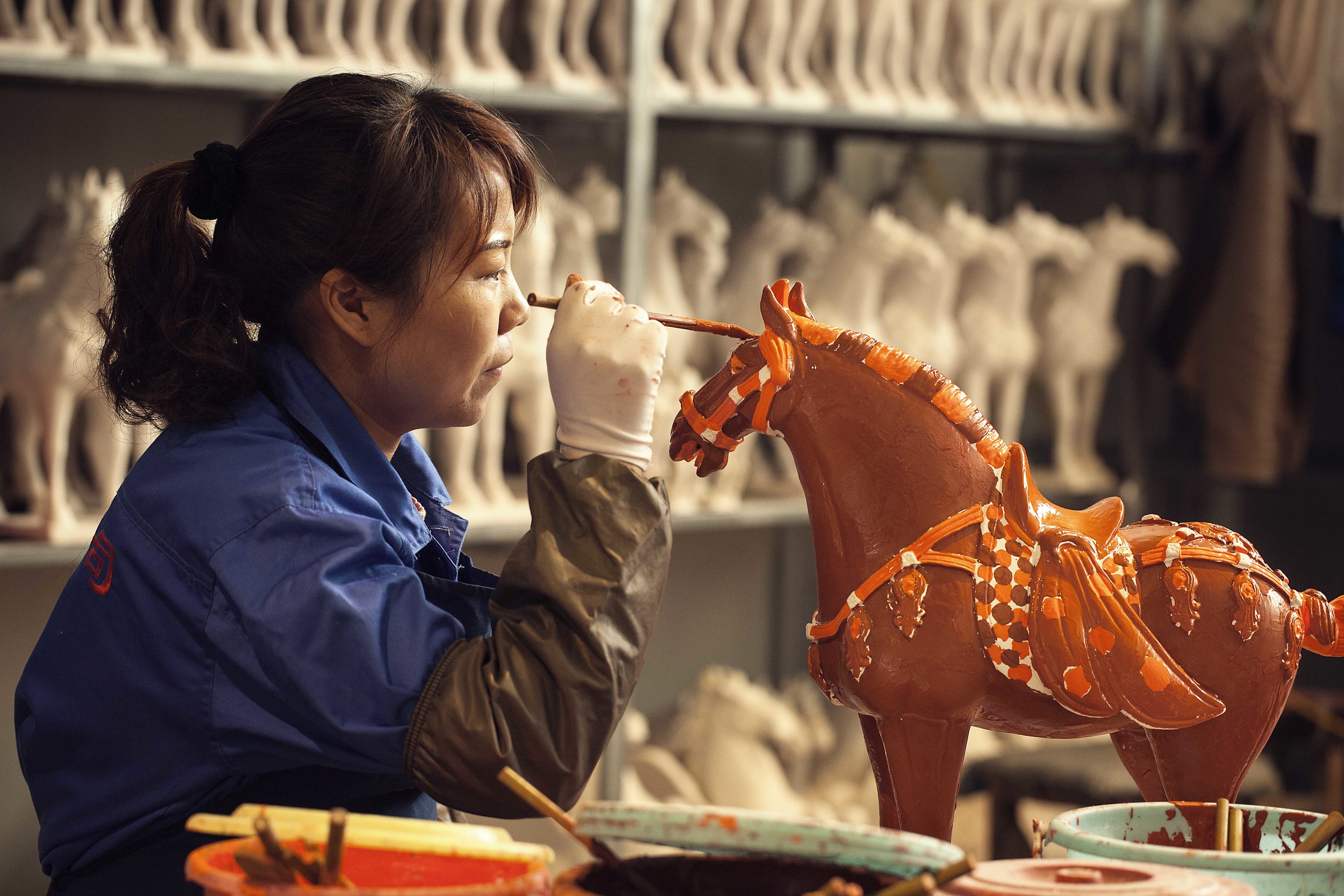 Painting horse with copper, iron and white colors.