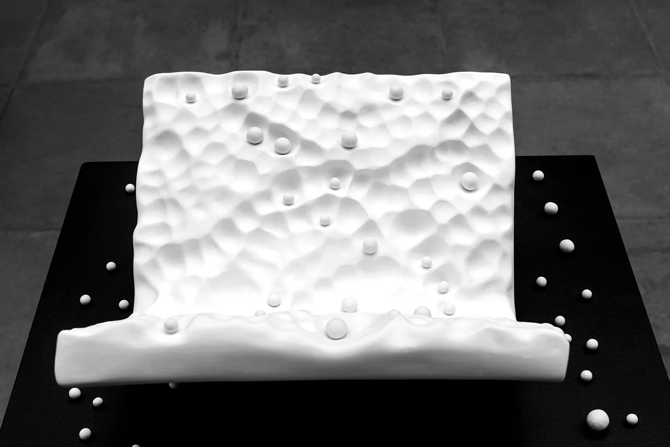LOGOS . 2014. Hydrocal, porcelain and string. 12 x 13 x 7 in